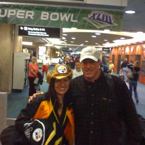 Trisha Simmons and NFL Hall of Fame Quarterback Jim Kelly on the way to cheer on the Steelers at The 43rd Super Bowl inTampa Bay.