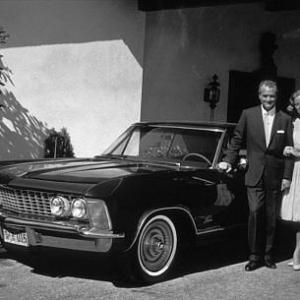 RED SKELTON  HIS WIFE GEORGIA WITH HIS NEW 1963 BUICK RIVIERA 1963