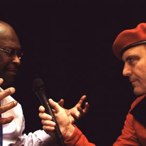 Still of Curtis Sliwa and Herman Cain in Évocateur: The Morton Downey Jr. Movie (2012)