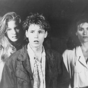 Still of Corey Haim, Lala Sloatman and Barbara Williams in Watchers (1988)