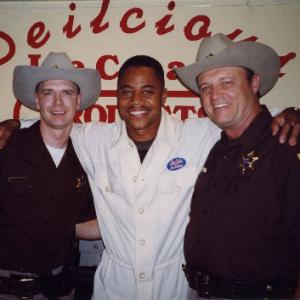Tommy Smeltzer Cuba Gooding Jr and Jim Grimshaw on the set of Chill Factor in 1998