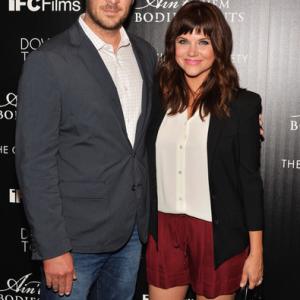 Brady Smith and Tiffani Thiessen attend the Downtown Calvin Klein with The Cinema Society screening of IFC Films Aint Them Bodies Saints at The Museum of Modern Art on August 13 2013 in New York City