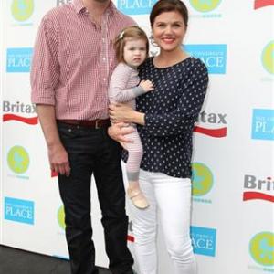 Brady Smith, Tiffani Thiessen and their daughter, Harper, attend the 2012 Baby Buggy Bedtime Bash hosted by Jessica and Jerry Seinfeld and sponsored by Britax and Children's Place, in New York on June 6, 2012