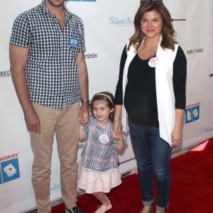 Brady Smith, Harper Renn Smith, Tiffani Thiessen arrive at the Milk + Bookies 6th Annual Story Time celebration held at Skirball Cultural Center on April 19, 2015 in Los Angeles, California.