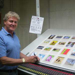 Cameron Smith printing the 2011 Inner Reflections Calendar that won the 2011 Benny Award for best calendar