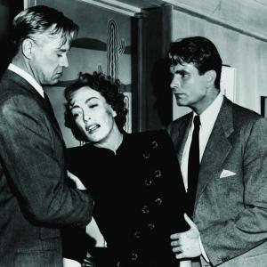 Still of Joan Crawford David Brian and Kent Smith in The Damned Dont Cry 1950