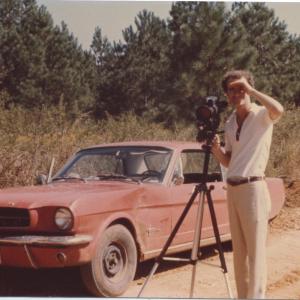Director Ross Spears filming AGEE in Hale County Alabama in 1976 Film car in background