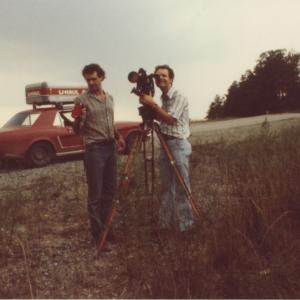 Director Ross Spears behind camera and cinematographer Anthony Forma during the filming of The Electric Valley in East Tennessee in 1982 Red Mustang in bg