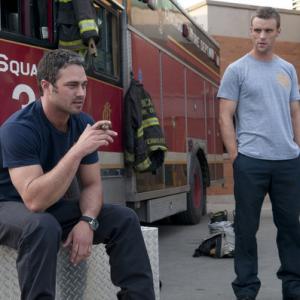 Still of Jesse Spencer and Taylor Kinney in Chicago Fire Pilot 2012