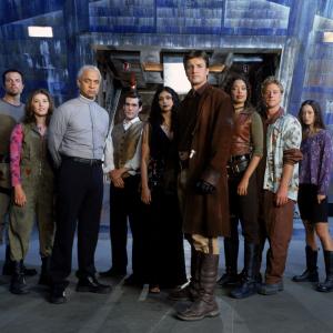 Still of Adam Baldwin, Nathan Fillion, Sean Maher, Jewel Staite, Gina Torres, Alan Tudyk and Morena Baccarin in Firefly (2002)