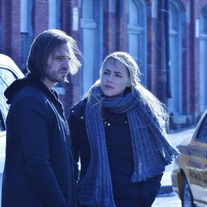 Still of Amanda Schull and Aaron Stanford in 12 Monkeys 2015
