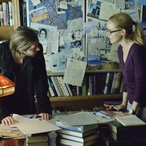 Still of Amanda Schull and Aaron Stanford in 12 Monkeys 2015