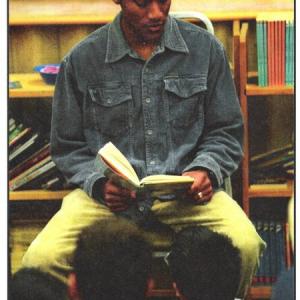 Ezra J. Stanley reads children's literature to fourth grade classes as part of the Screen Actors Guild BookPALS volunteer program.