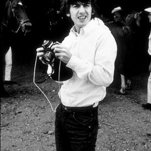 George Harrison and Ringo Starr (in background) in Ozarks, Arkansas, circa 1965.