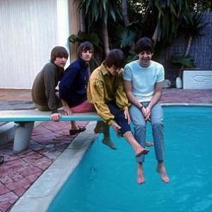 The Beatles John Lennon Ringo Starr George Harrison Paul McCartney on the diving board by the poolside