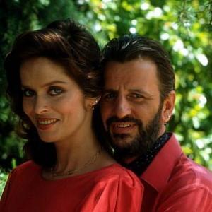 Ringo Starr holds wife Barbara in his arms from behind