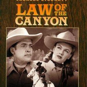 Nancy Saunders and Charles Starrett in Law of the Canyon 1947