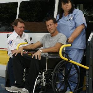Mike Delfino (James Denton), Westeria Lane resident being taken away by Paramedic (Alan Stepp) and the hospital Nurse(?)