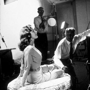 Elaine Stewart being photographed by Ray Jones, 1953.