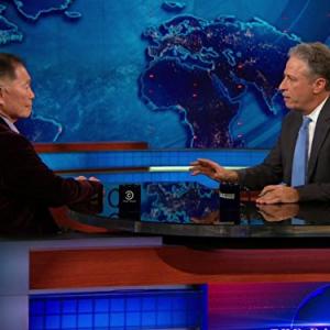 Still of George Takei and Jon Stewart in The Daily Show 1996