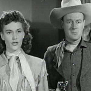 Peggy Stewart and Russ Whiteman in Alias Billy the Kid 1946
