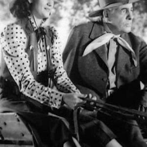 Tom Chatterton and Peggy Stewart in Code of the Prairie 1944
