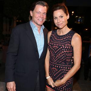 Brett Stimely and Minnie Driver attend the Television Academy's 66th Emmy Awards Performers Peer Group Celebration (7-28-2014)