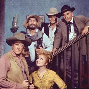Still of James Arness, Amanda Blake, Ken Curtis and Milburn Stone in Gunsmoke (1955)