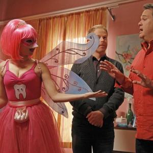 Still of Jesse Tyler Ferguson Sarah Hyland and Eric Stonestreet in Moderni seima 2009