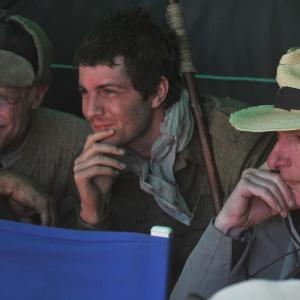 Still of Ed Harris Peter Weir and Jim Sturgess in The Way Back 2010
