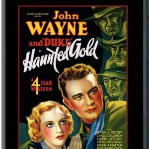 John Wayne and Sheila Terry in Haunted Gold (1932)