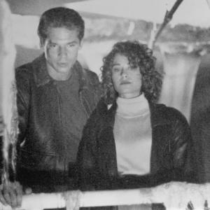 Still of Julie Warner and Eric Thal in The Puppet Masters 1994