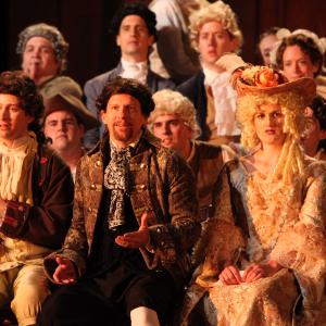 Kevin Theis (center) as Antonio Salieri in the Oak Park Festival Theatre's production of 
