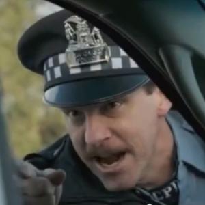 Kevin Theis as Mean Cop in S01E10 of 