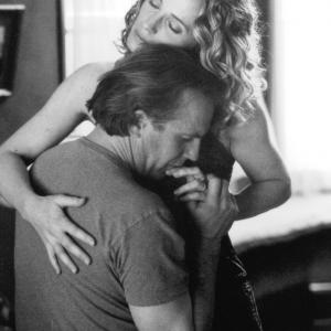 Still of Kevin Costner and Susanna Thompson in Dragonfly (2002)