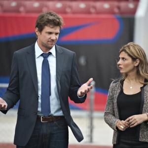 Still of Marc Blucas and Callie Thorne in Necessary Roughness 2011