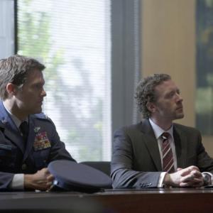 Still of Geoff Stults and TJ Thyne in The Finder 2012