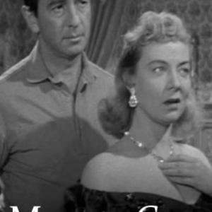 Macdonald Carey and Audrey Totter in Man or Gun 1958