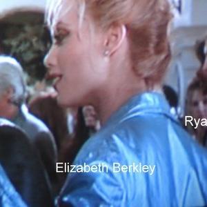 Kyle MacLachlan Elizabeth Berkley and Ryan Tower far righton set of Showgirls in Malibu CA