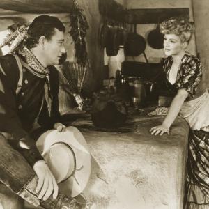 Still of John Wayne and Claire Trevor in Stagecoach 1939