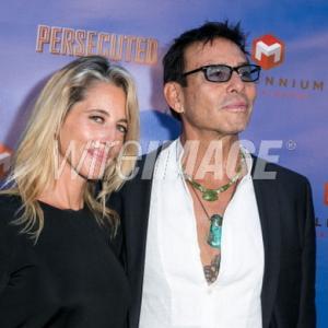Raoul Trujillo and Michelle MartinCoyne at Hollywood premiere of Persecuted