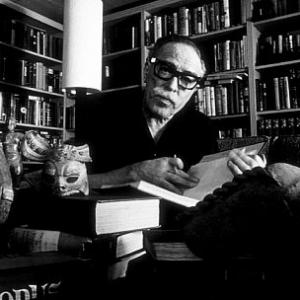 Dalton Trumbo in his office with his collection of Pre-Columbian art, 1961.