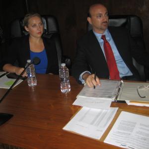Alicia L Harris and James Tumminia as District Attorney Ben James in Strike One