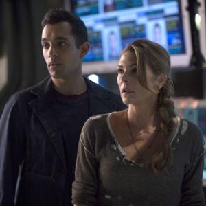 Still of Paige Turco and Sachin Sahel in The 100 2014