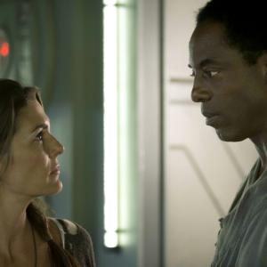 Still of Paige Turco and Isaiah Washington in The 100 2014