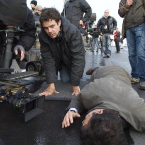 Still of Clive Owen and Tom Tykwer in The International 2009