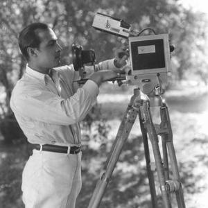 Rudolph Valentino with camera tripod