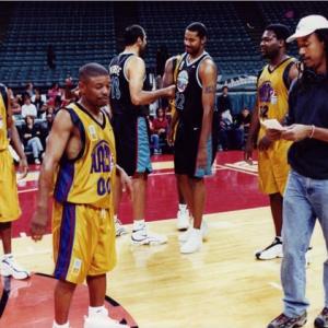 Mugsy Bogues  Jesse Vaughan Vlade Divac and Rasheed Wallace in the background