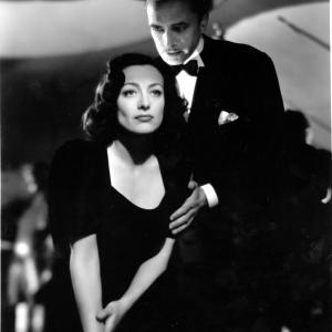 Still of Joan Crawford and Conrad Veidt in A Womans Face 1941