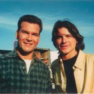 Patrick Swayze and Brian Vincent Kelly during filming of Black Dog Universal